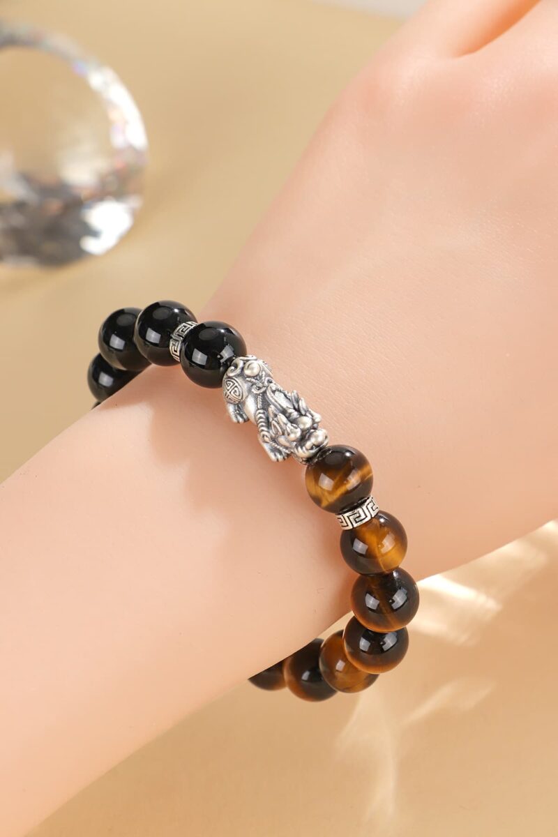 yellow tiger eye and black Onyx beadsed feng shui bracelet with genuine Silver Pixiu Symbol